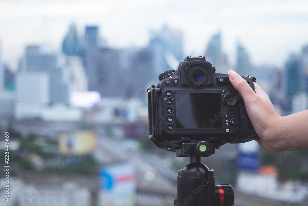 Photographer handling digital camera