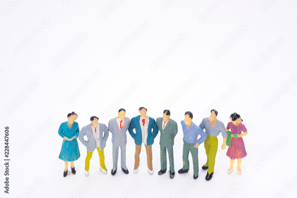 Group of figure miniature businessman or small people investor and office worker secretary on white background for money and financial business teamwork concept. Group of figure miniature businessman or small people investor and office worker secretary on white background for money and financial business teamwork concept.