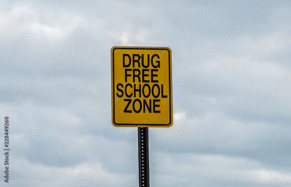 sign says drug free school zone sign says drug free school zone