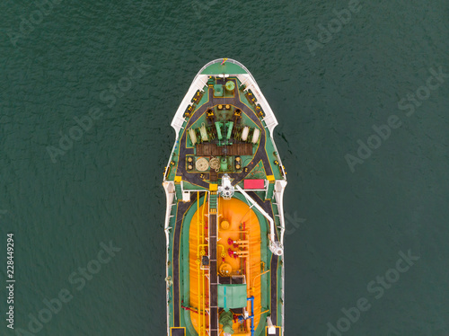 Aerial Top View of sea freight, Crude oil tanker lpg ngv at industrial estate Thailand / Crude Oil tanker to Port of Singapore - import export around in the world