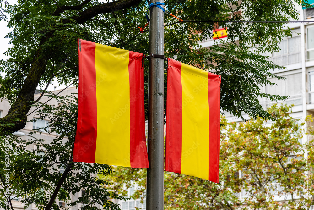 Spanish flags during Spanish National Day Army Parade Stock Photo