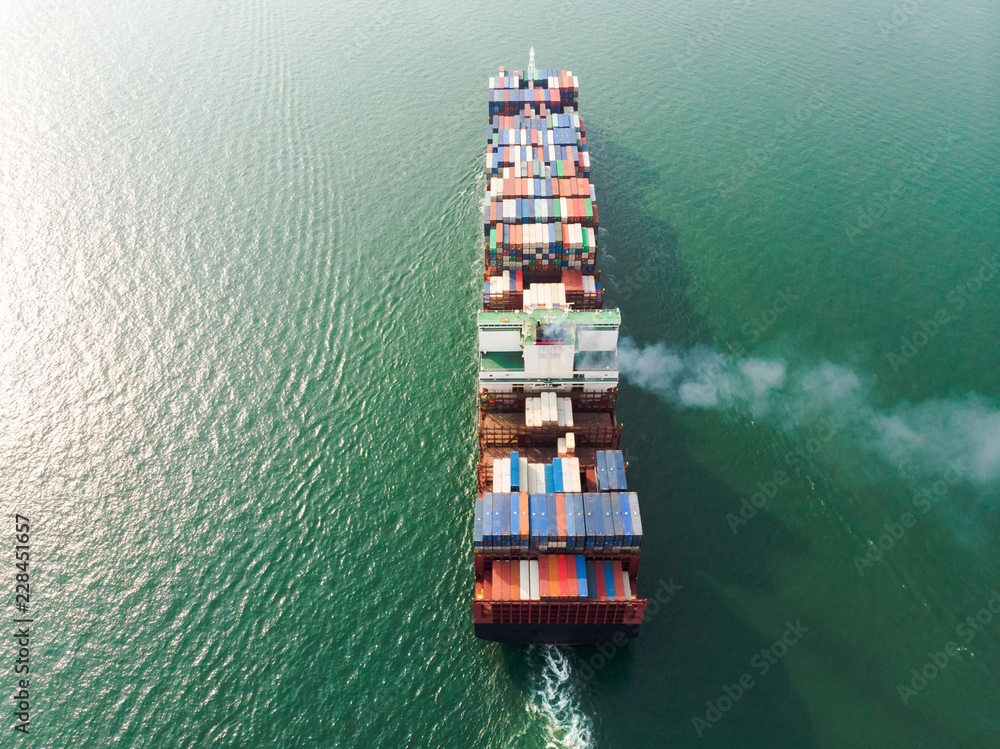 Aerial view of sea freight, Cargo ship, Cargo container in warehouse harbor at industrial estate Thailand, Trade Port / Shipping - cargo to harbor