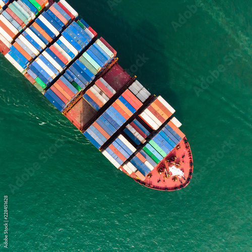 Aerial view of sea freight, Cargo ship, Cargo container in factory harbor at industrial estate for import export around in the world, Trade Port / Shipping - cargo to harbor