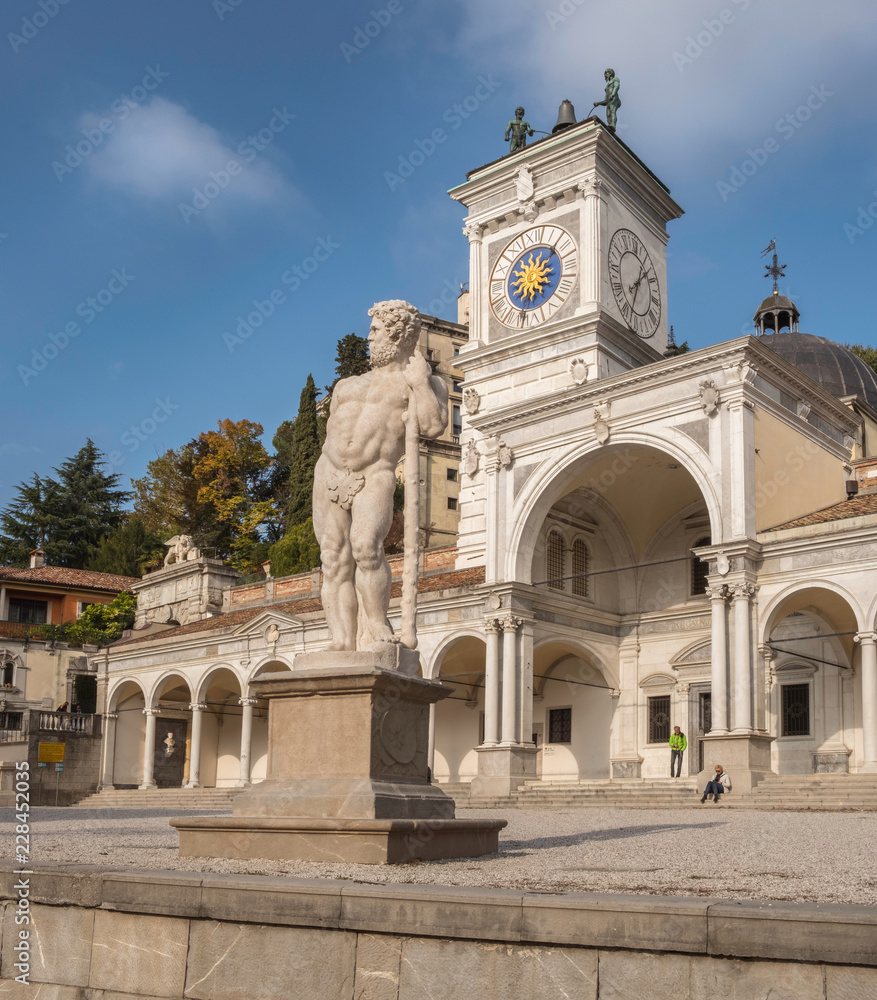 Statue of Hercules in front of porch of Saint Giovanni in Udine, Italy