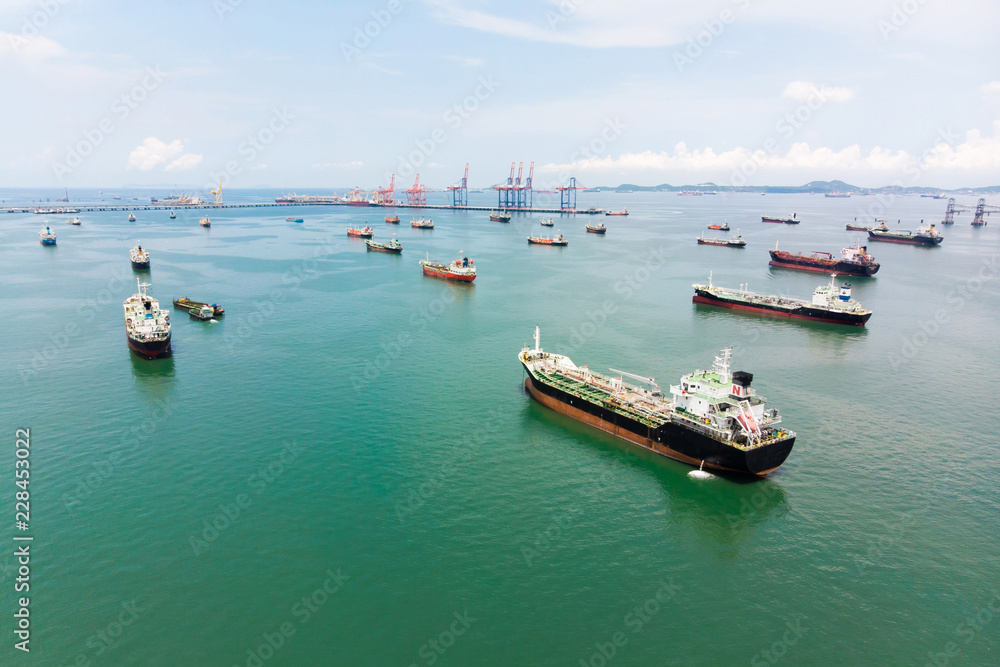 Aerial view of sea freight, Crude oil tanker lpg ngv at industrial estate Thailand / Crude Oil tanker to Port of Singapore - import export around in the world