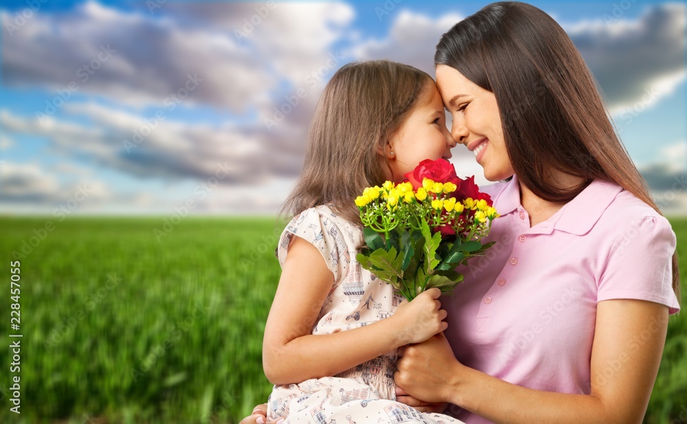 Happy Mother and daughter hugging Happy Mother and daughter hugging