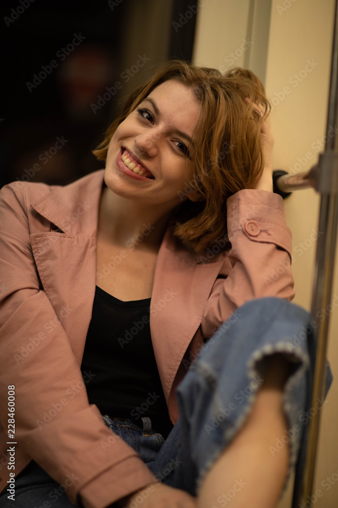 Fototapeta premium Street photo shoot with a wonderful girl.Photo shoot in Moscow in the great hearth, the whipping Kolomenskoye
