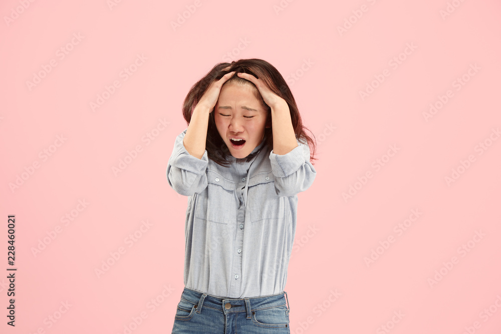 Why is that. Beautiful female half-length portrait isolated on trendy pink studio backgroud. Young emotional surprised, frustrated and bewildered woman. Human emotions, facial expression concept. Why is that. Beautiful female half-length portrait isolated on trendy pink studio backgroud. Young emotional surprised, frustrated and bewildered woman. Human emotions, facial expression concept.