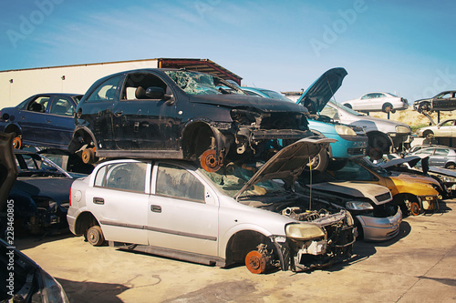 A graveyard of cars, broken cars sell on spare parts.