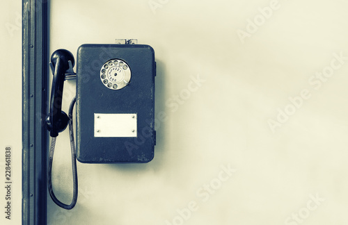 Obraz na plátně Old public payphone on the wall
