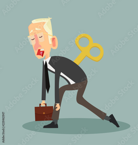 Tired businessman with Clockwork key
