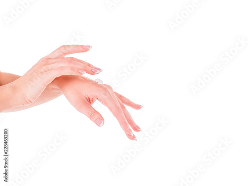Beautiful women hands isolate, applying cream and massaging