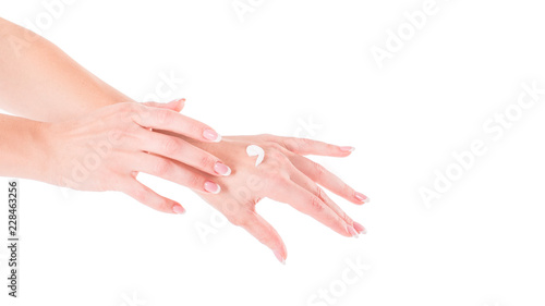 Beautiful women hands isolate, applying cream and massaging