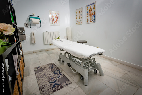 A physiotherapy cabinet at a Clinic, side standing view, ready to attend patients