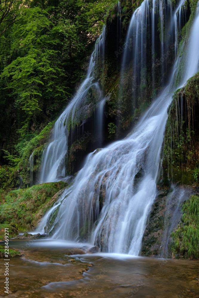 Fototapeta premium French landscape - Jura. Waterfall in the Jura mountains after heavy rain.