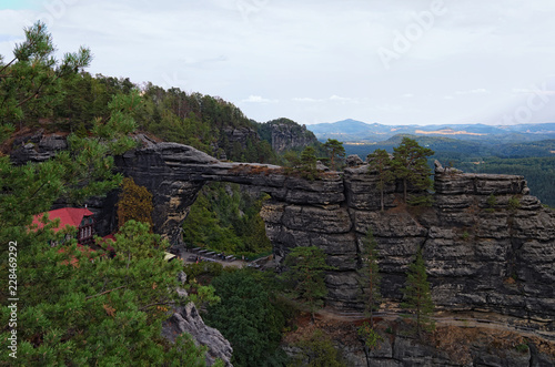 Amazing natural monument, rock monument, sandstone gate - Pravcice Gate in Bohemian Switzerland National Park. The biggest natural bridge in Europe. Touristic place and travel destination in Europe