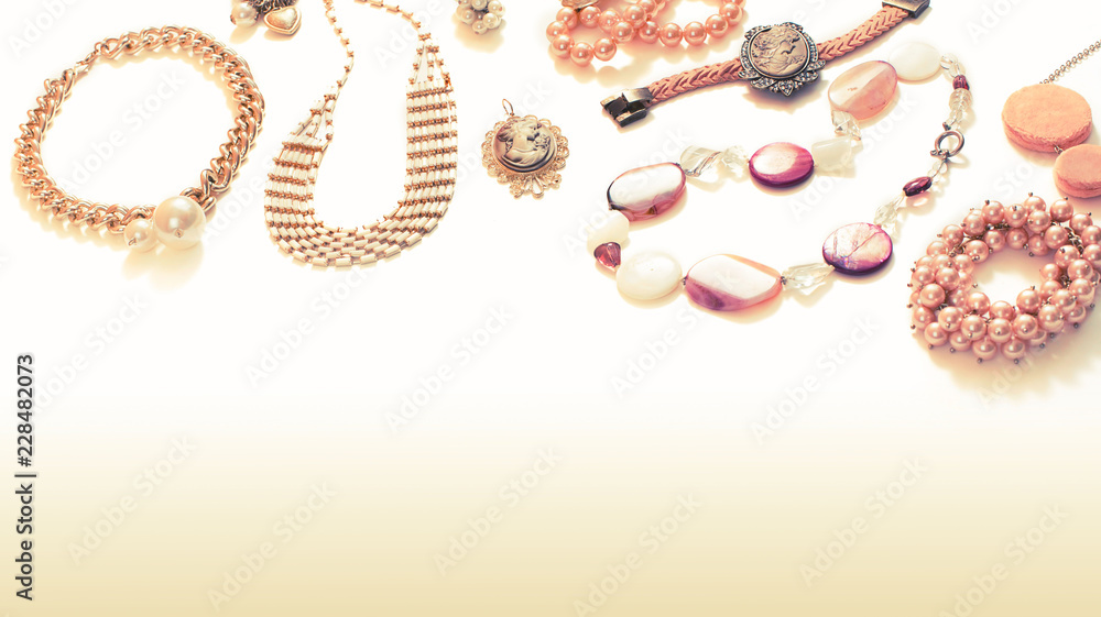Set of jewelry in retro style on white gradient background Top view flat lay copy space Set of jewelry in retro style on white gradient background Top view flat lay copy space