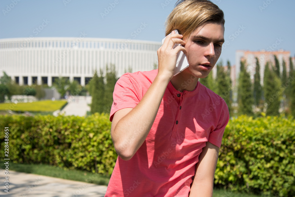 Sad student talking on the phone 