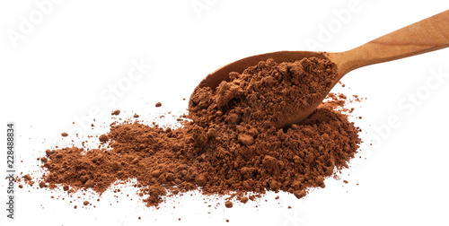 Cocoa powder in spoon isolated on white background