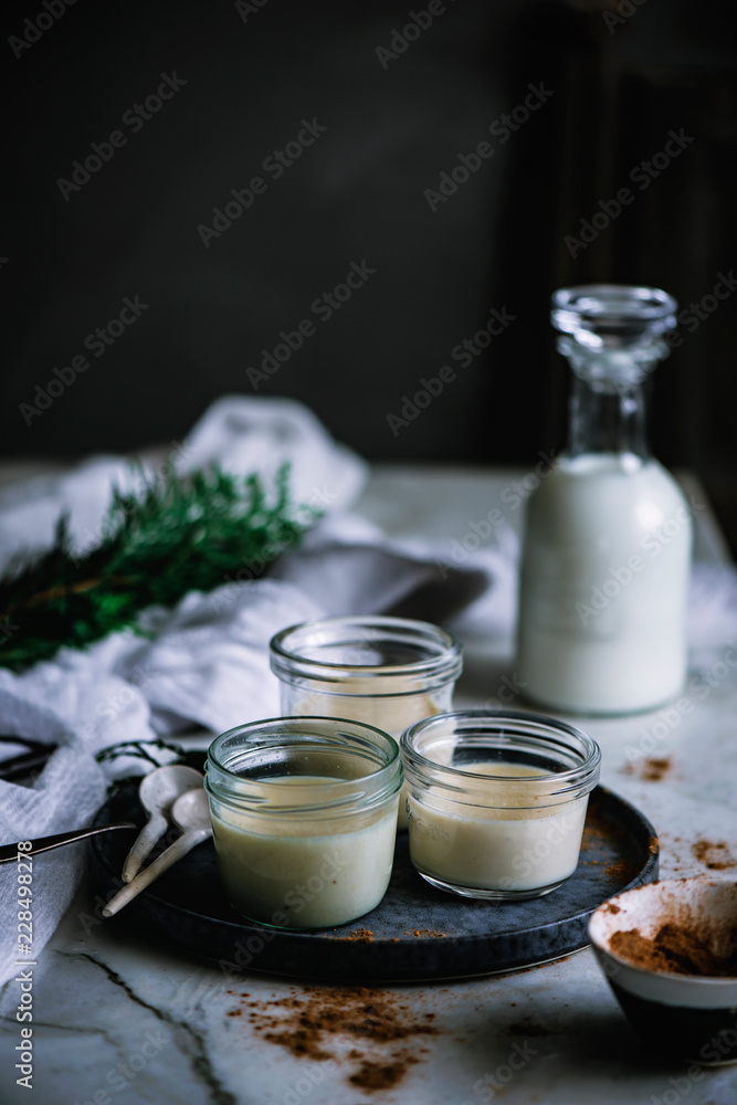 Jars with custard and chocolate desert Jars with custard and chocolate desert