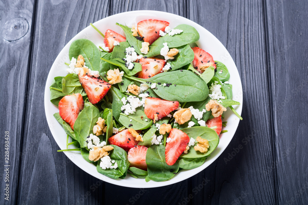 Strawberry salad with spinach , cheese and walnut Strawberry salad with spinach , cheese and walnut