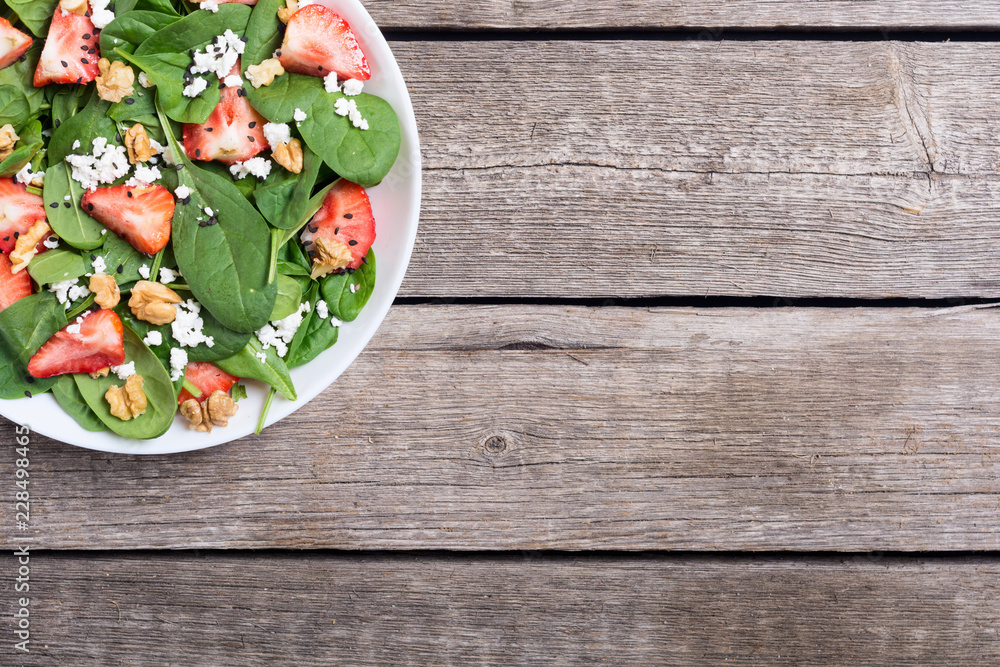Strawberry salad with spinach , cheese and walnut Strawberry salad with spinach , cheese and walnut