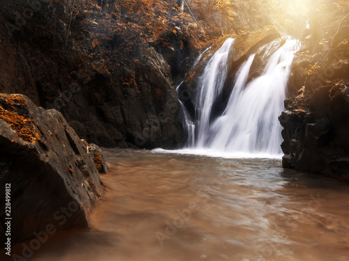 Nature stream waterfall in forest.