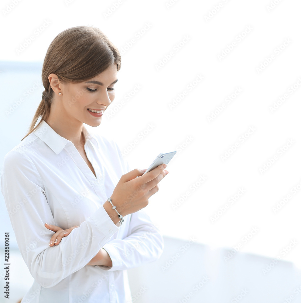young professional reading SMS on smartphone, young professional reading SMS on smartphone,