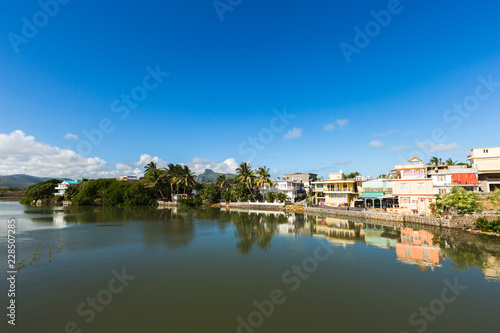 River scene with mountains in Mahebourg, Mauritius. Mauritius, an Indian Ocean island nation, is known for its beaches, lagoons and reefs. © LR Photographies