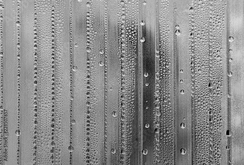 abstract background with big and small water drops in different colors - white with black
