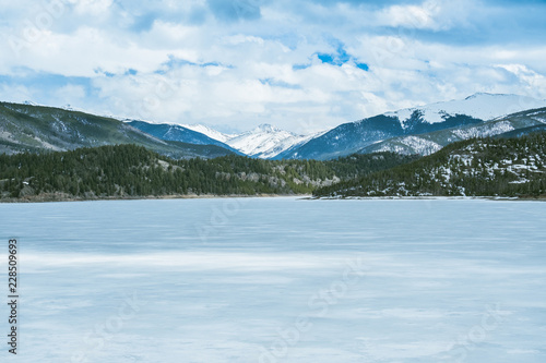 BEAUTIFUL VIEW OF DILLON RESERVOIR AND ROCKY MOUNTAINS IN BRIGHT DAY IN LATE WINTER / COLORADO / USA photo