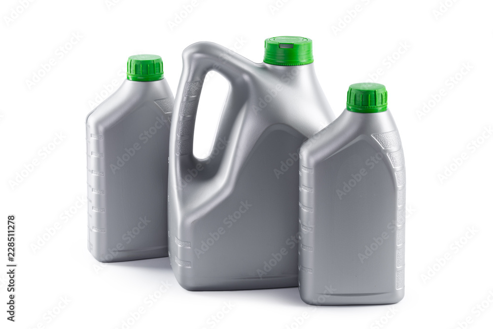 Plastic bottles from automobile oils isolated on a white background Plastic bottles from automobile oils isolated on a white background
