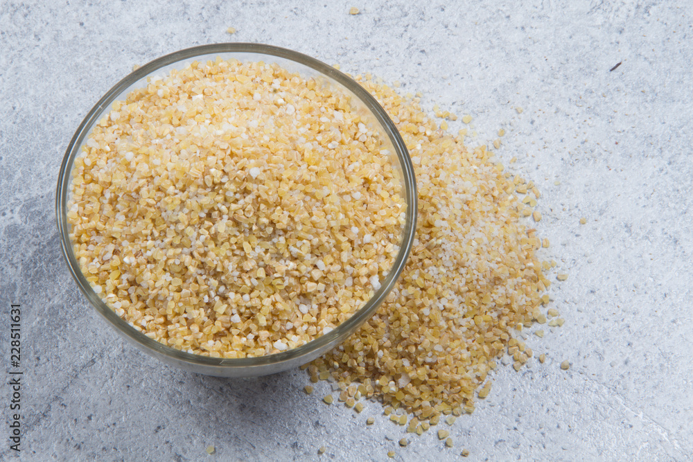 bulgur seeds isolated on texture background bulgur seeds isolated on texture background