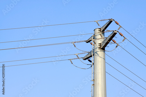 high voltage electric power steel tube tower under the blue sky