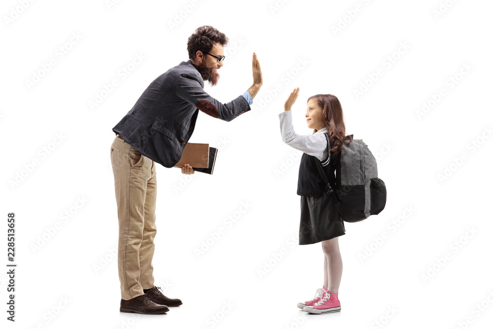 Teacher high-fiving a schoolgirl