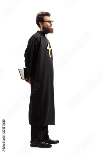 Φωτογραφία Priest with a bible waiting in line