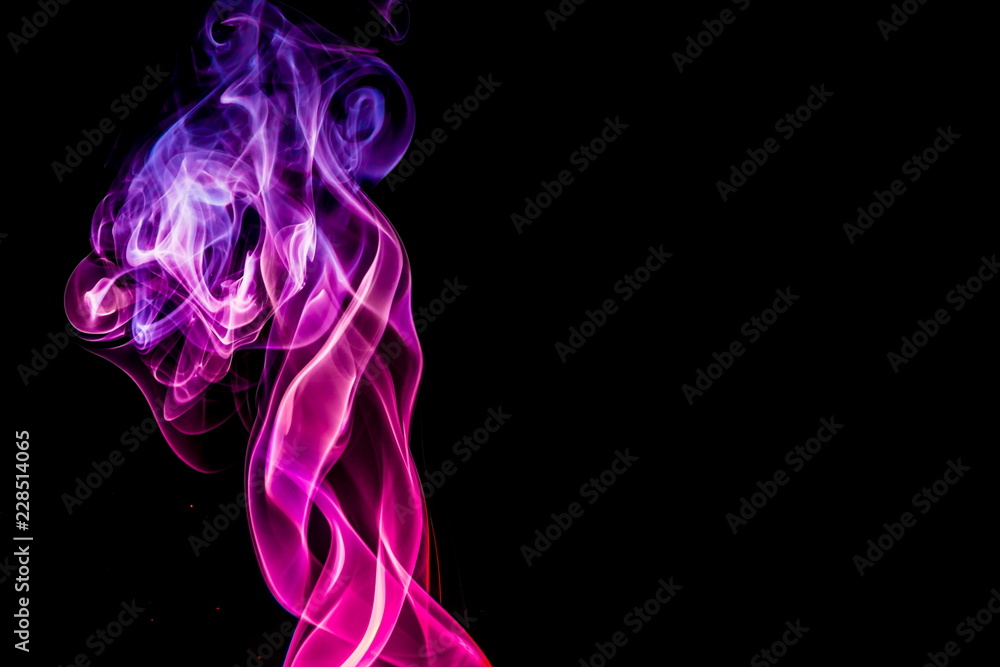 Colored smoke on black background Colored smoke on black background