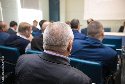 People sitting rear at the business conference