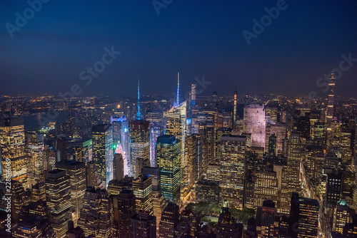 View of the night city and glowing skyscrapers from a height. New York. USA. 