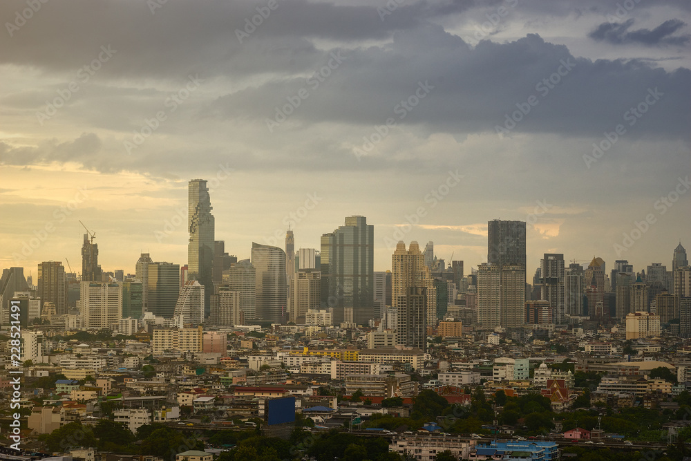 scenic of cityscape with sun light and cloudscape