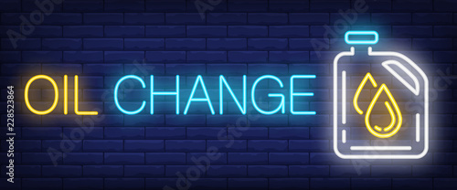 Oil change neon text with canister. Car service advertisement design. Night bright neon sign, colorful billboard, light banner. Vector illustration in neon style.