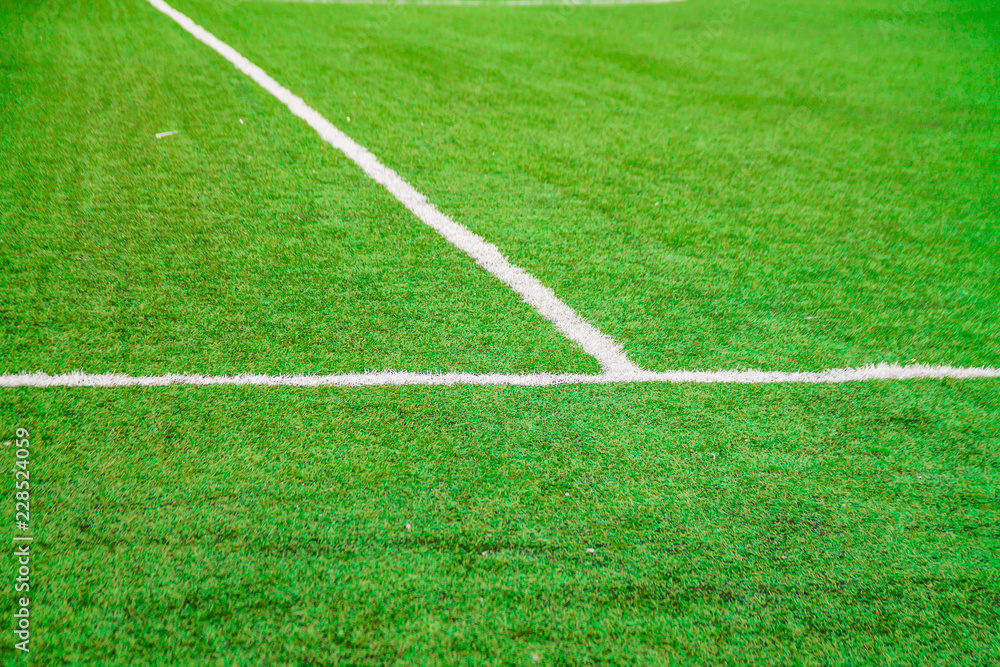 bright green football soccer field with marking for sport games