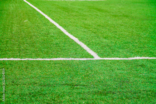 bright green football soccer field with marking for sport games