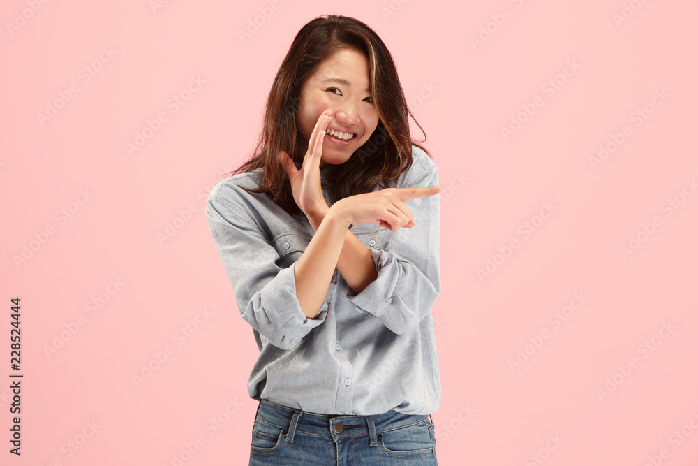 Secret, gossip concept. Young woman whispering a secret behind her hand. Business woman isolated on trendy studio background. Young emotional woman. Human emotions, facial expression concept. Secret, gossip concept. Young woman whispering a secret behind her hand. Business woman isolated on trendy studio background. Young emotional woman. Human emotions, facial expression concept.