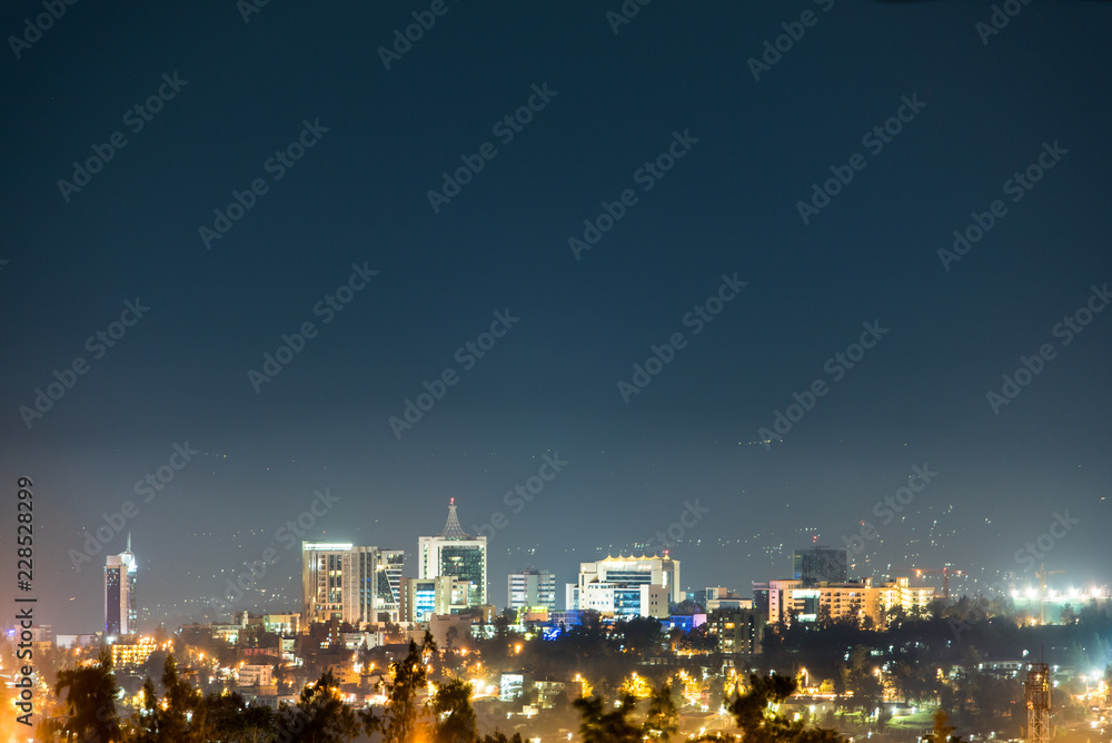 A wide view of Kigali city skyline lit up at night