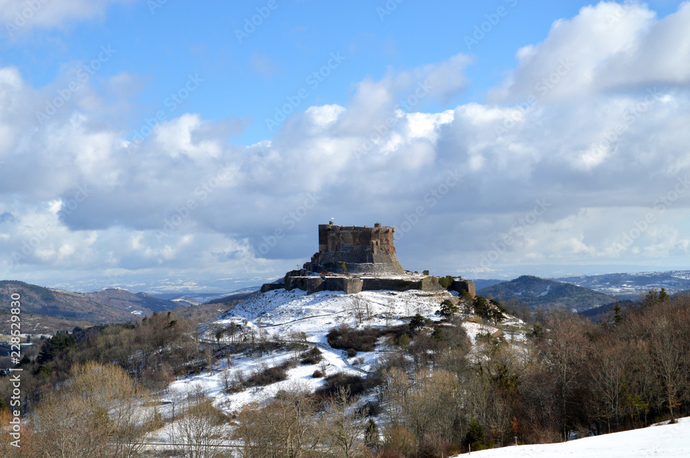 A beautiful medieval castle in a winter landscape