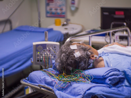 Blurred of elderly patient with encephalography electrode. Electroencephalogram,EEG record in clinic.