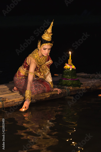 beautiful thai model wearing thai traditiomal loy kratong festival photo