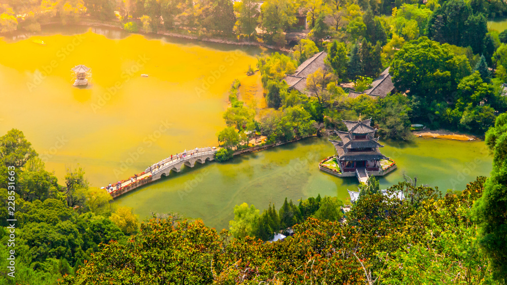 Suocui Bridge over Black Dragon Pool at Moon Embracing Pavilion in Jade Spring Park, Lijiang, China. Aerial view
