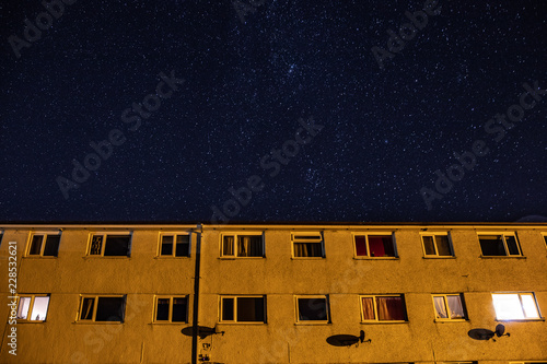 Stars over an Apartment block. Tenement with stars moving overhead. London UK. Lake District UK.
